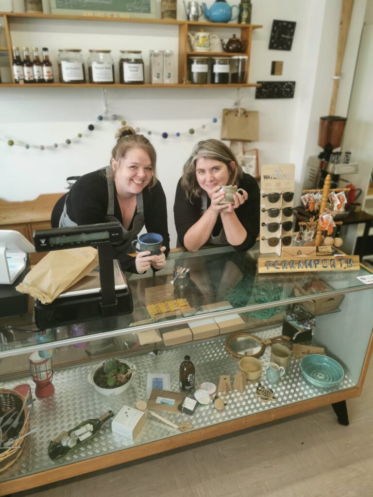 Owners Lara and George behind the shop counter